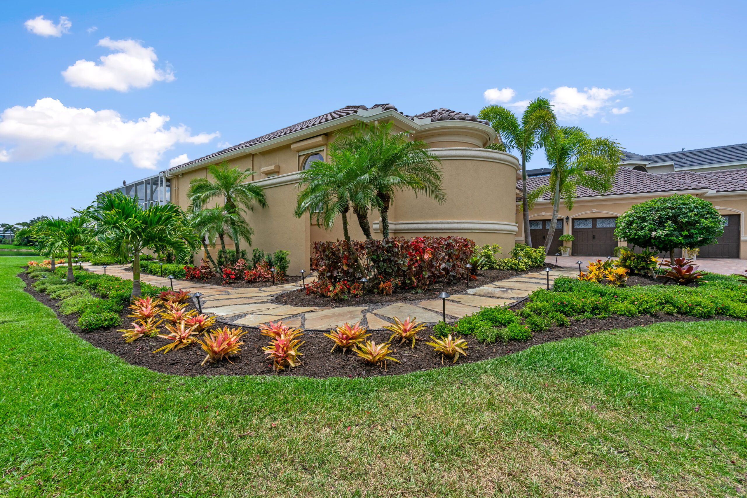 A home with landscaping in front of it